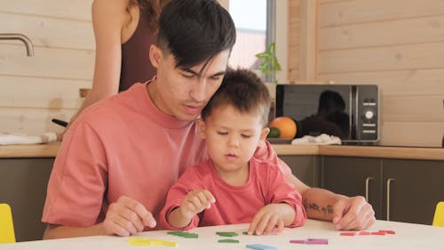 Family Spending Time Together at the Kitchen