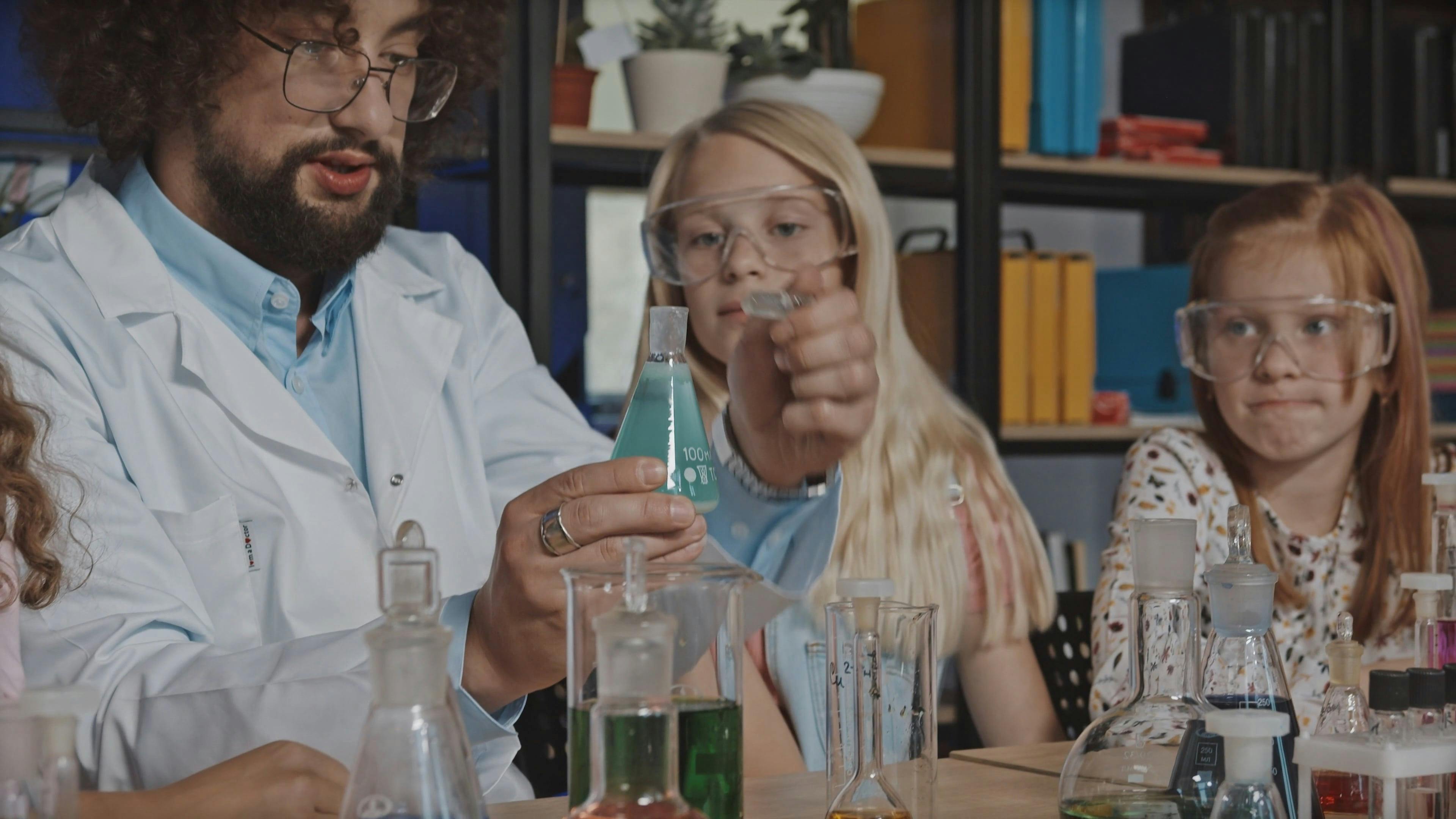 Teacher and Students in Chemistry Class · Free Stock Video