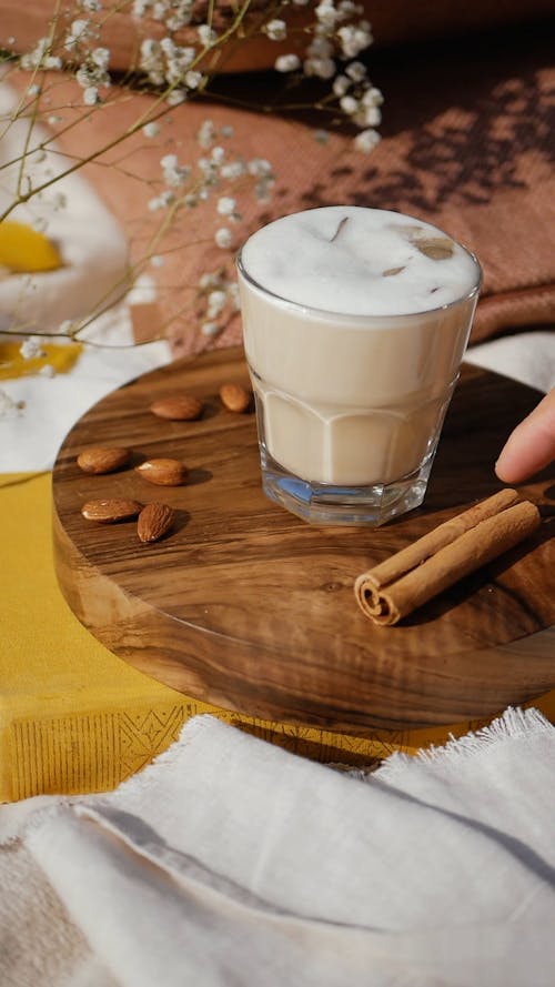 Dipping Cinnamon Roll to the Cold Coffee