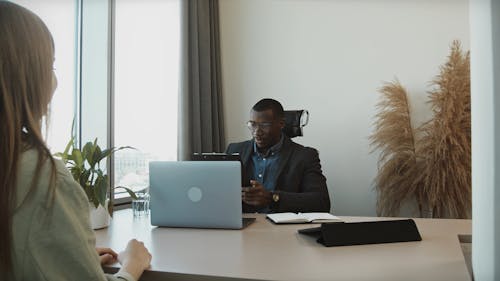 Interviewer Shaking Hands with the Applicant