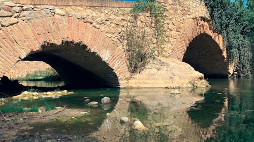 An Old Bridge Over a River