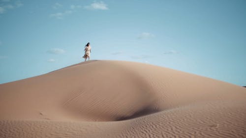 A Woman Running on the Desert