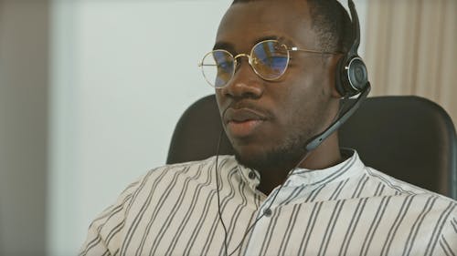 Man Working on a Call Center