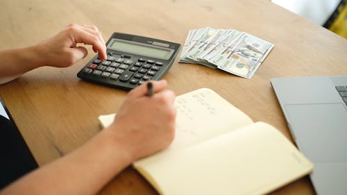 Person Using a Calculator