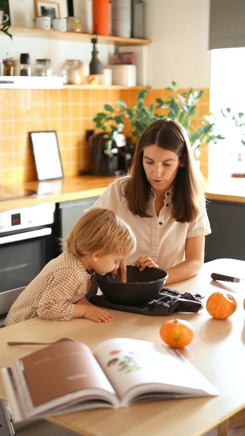 A Woman Mixing the Bowl