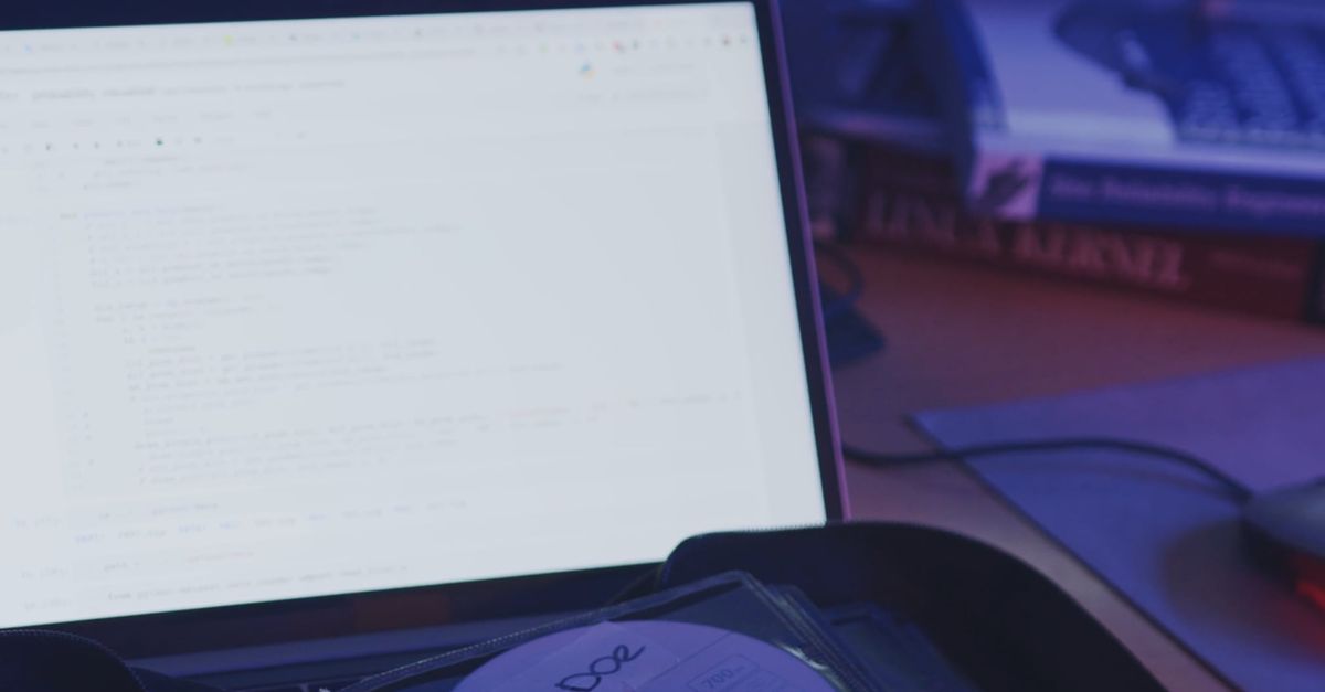 Coding Disc A Female Coder Placing the Compact Disc in Case Free Stock Video ...