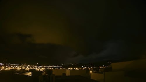 Clouds Formation Over A Community At Dusk