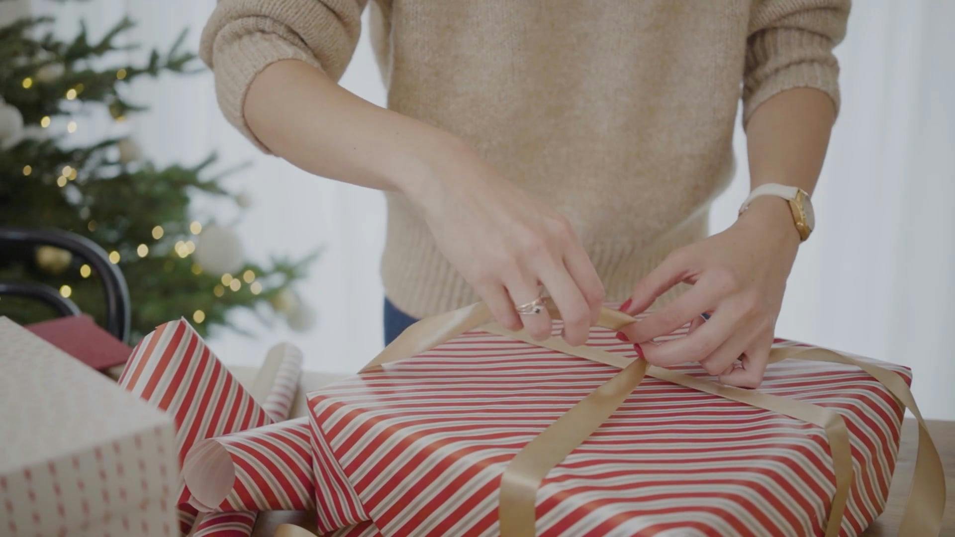 A Woman Wrapping Gifts · Free Stock Video