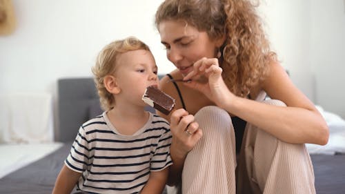 Mother and Son Sharing a Popsicle