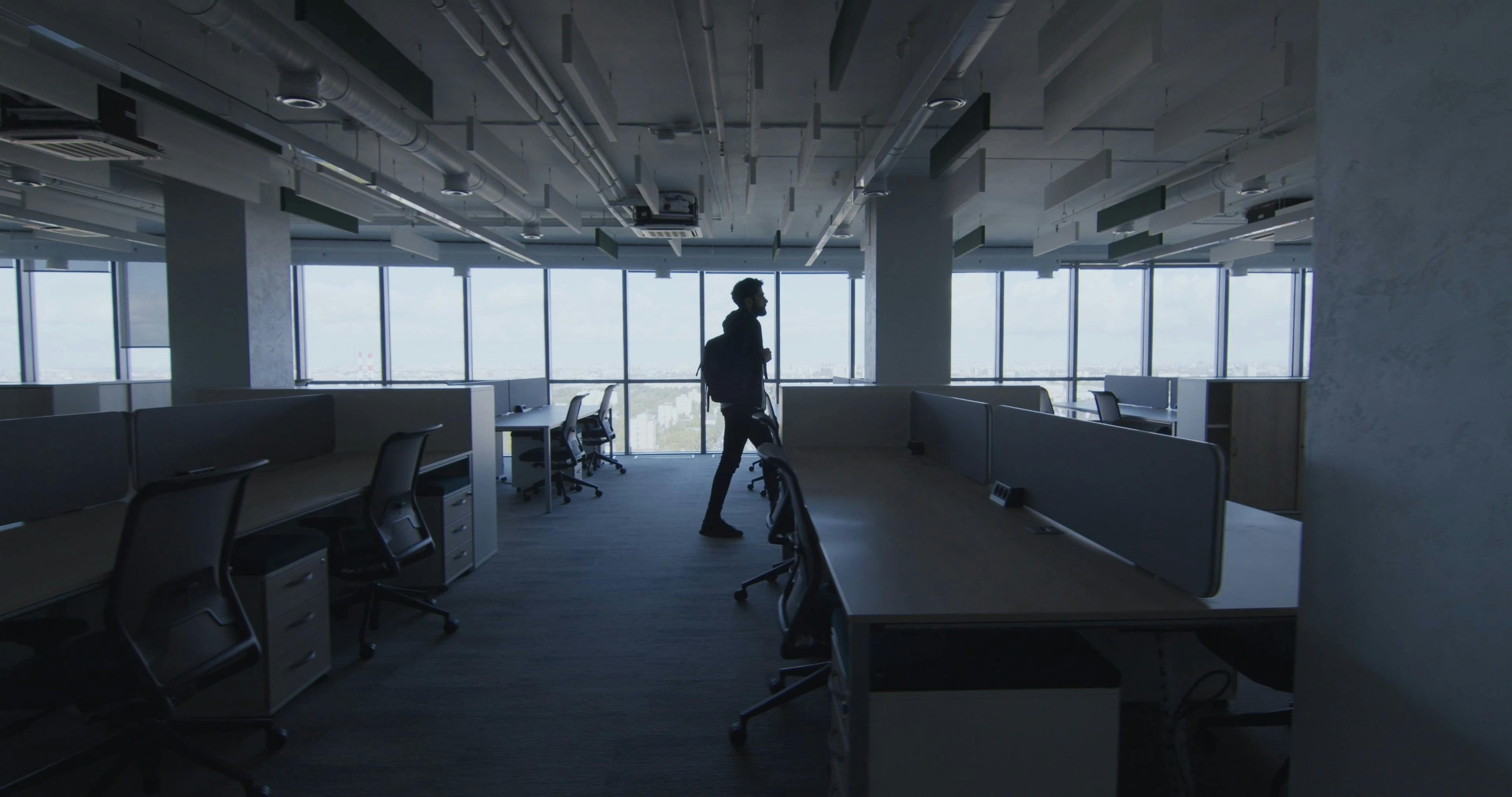 A Man Walking Inside an Office · Free Stock Video