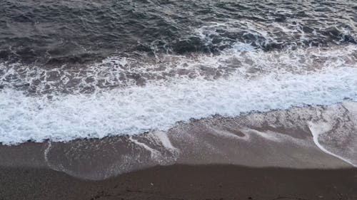 Sea Waves Crashing on Beach Shore