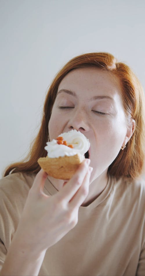 A Woman Eating a Pumpkin Pie