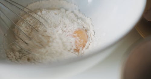 Mixing Baking With Flour And Raw Egg