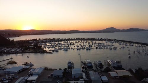 Aerial Footage of a Harbor Bay During Sunset