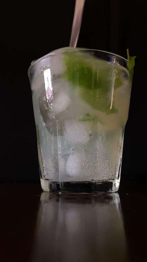 Low Angle Shot of Mixing a Lemonade Drink