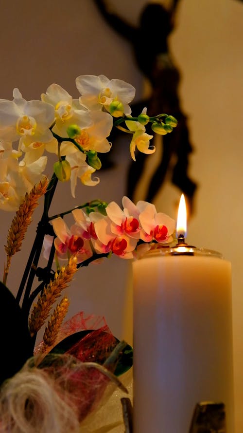 Close Up View of Burning Candle at a Chapel