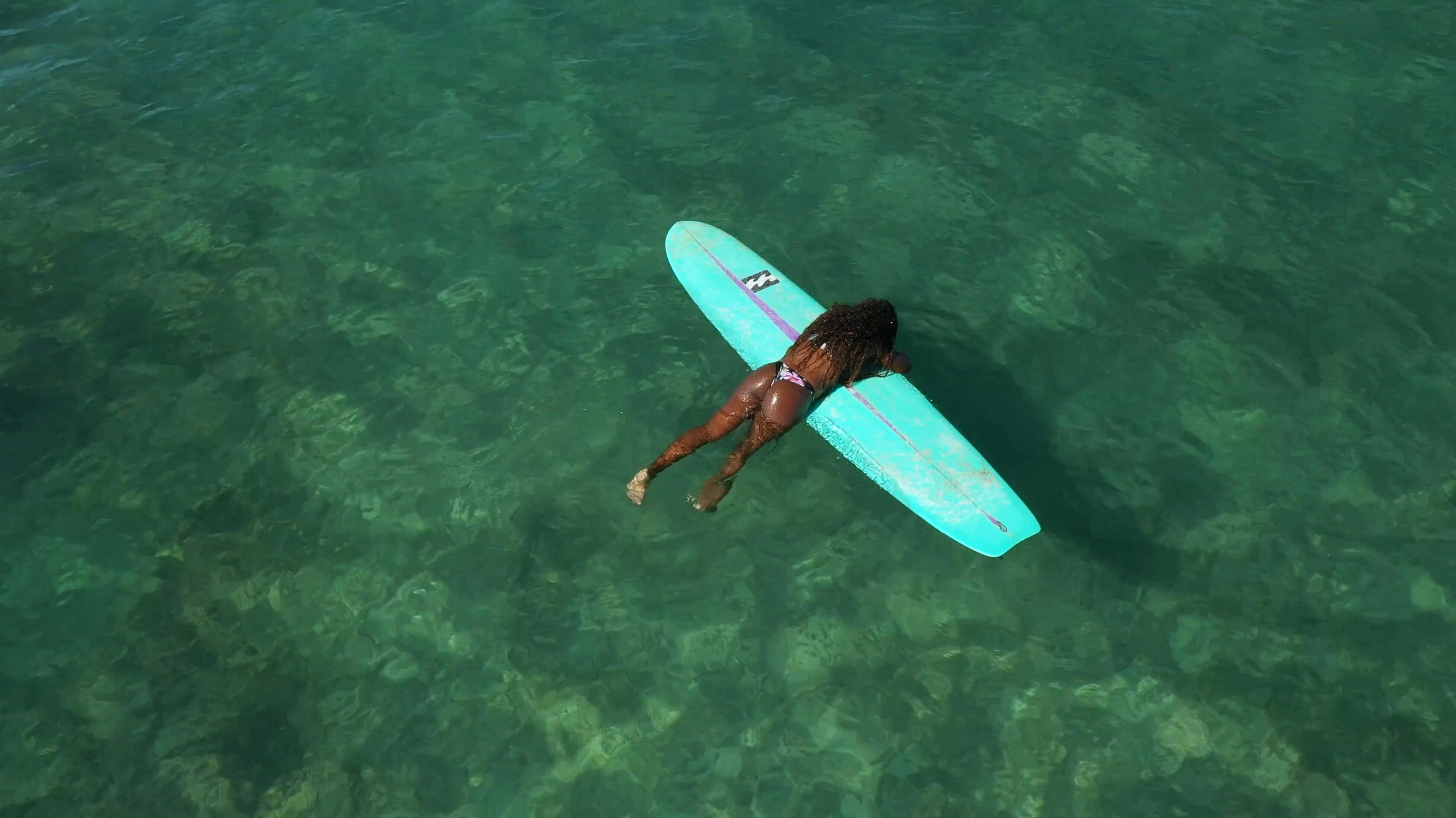 A Woman Relaxing on Sea With Her Surfboard · Free Stock Video