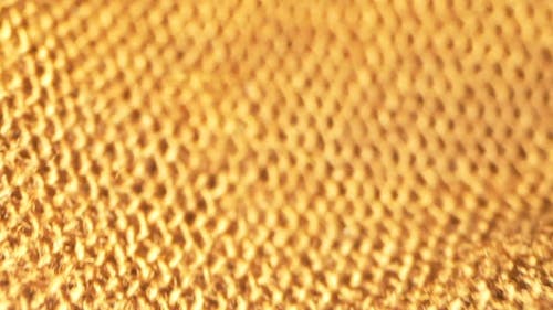 Macro View of a Yellow Weaved Fabric