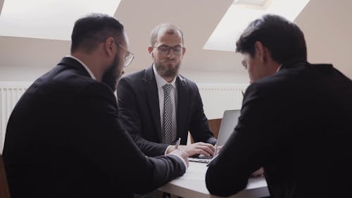 Men talking In A Business Meeting