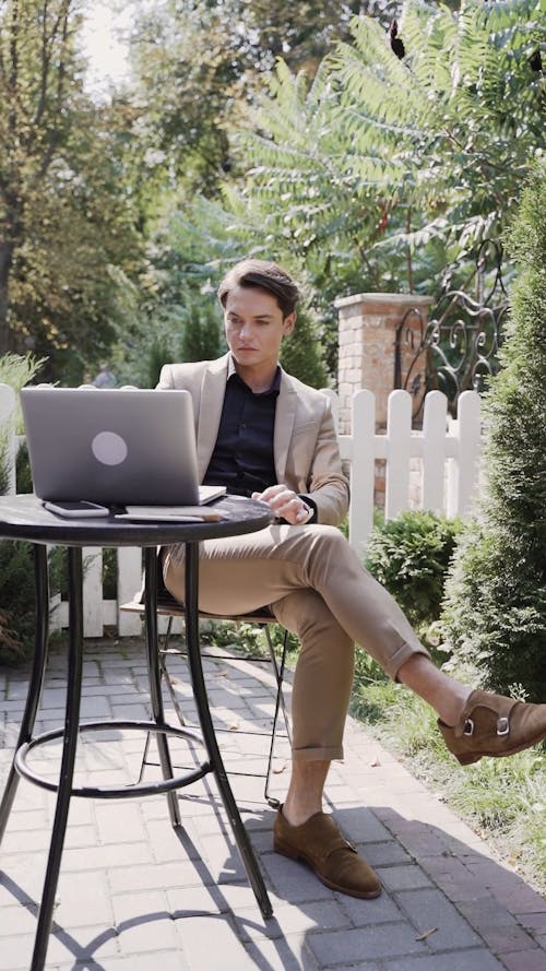 A Man Doing Business Outdoors