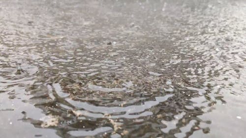 Heavy Rainfall on a House Roof