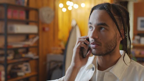 A Young Man Talking On His Cellphone