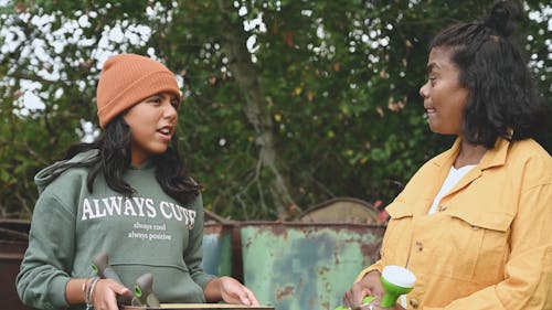 Two Women Talking Outdoors