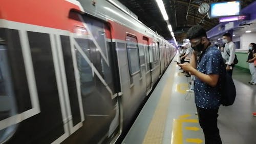 People Going Inside the Train