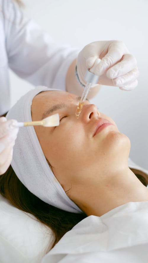 A Woman Getting a Her Face Rehydrated