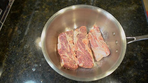 Close-Up View of a Person Preparing a Food