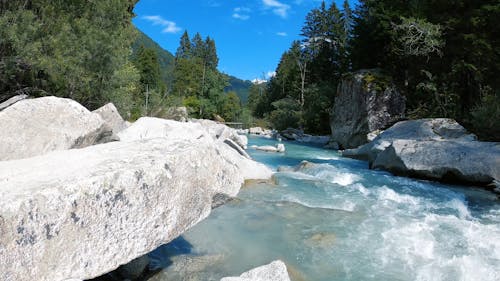 View of River Flowing Through Rocks 