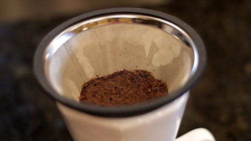 Person Making a Coffee