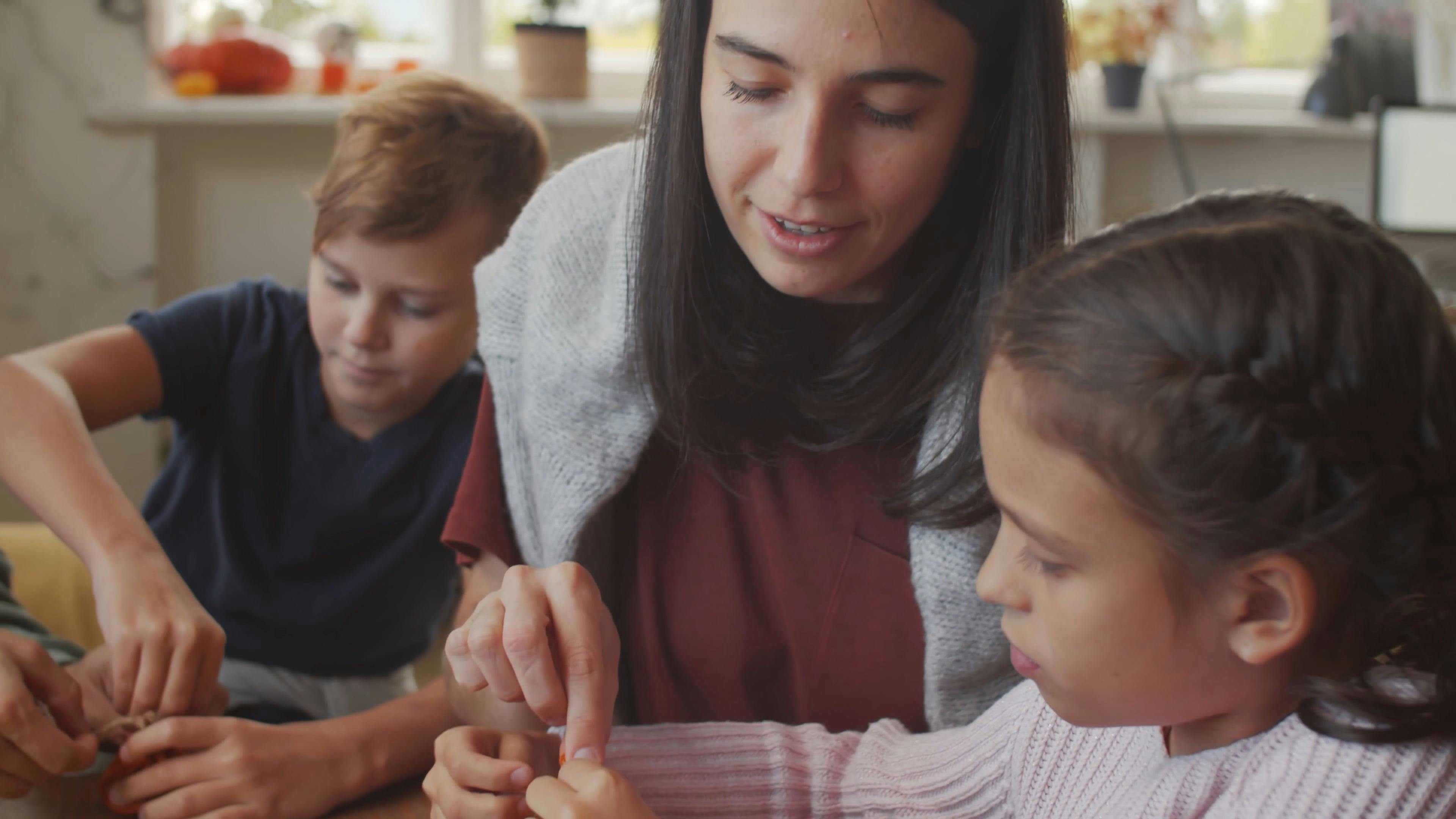 Family Making Halloween Decorations · Free Stock Video