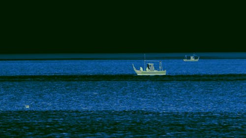 Fishing Boat Sailing on the Sea