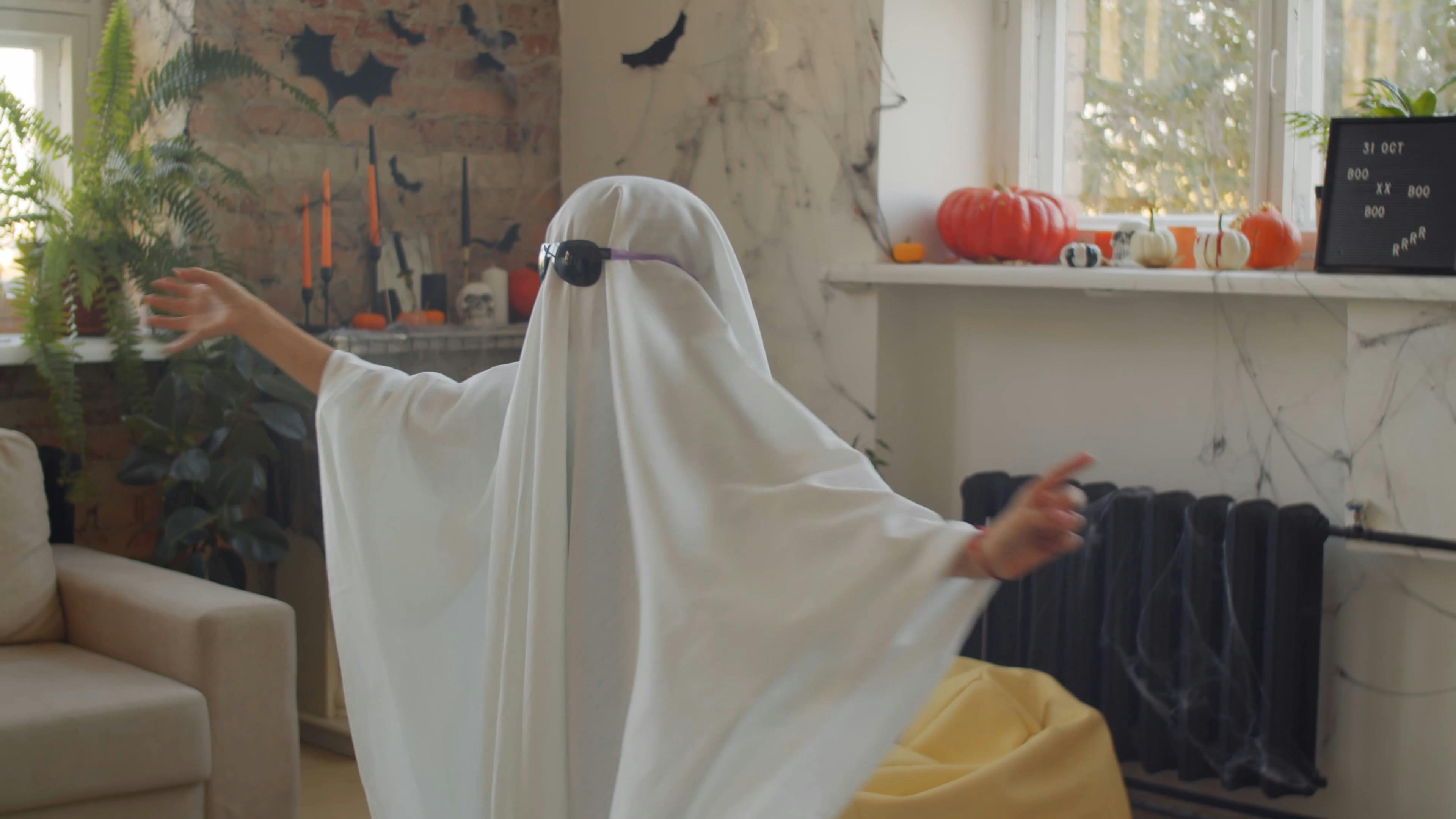 A Kid Wearing A Ghost Costume · Free Stock Video