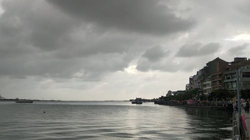 Panoramic View of Sea with Coastal City Shore 