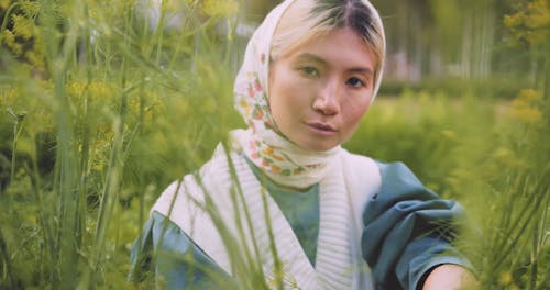 Woman Modeling and Posing on the Garden