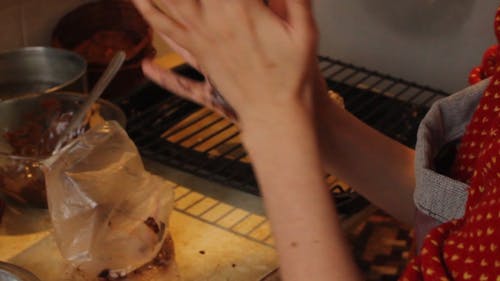 Female Hands Preparing Chocolate Cookies