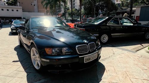 A BMW Leaving a Parking Lot