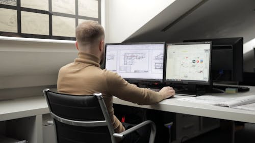 A Man Working on a Computer