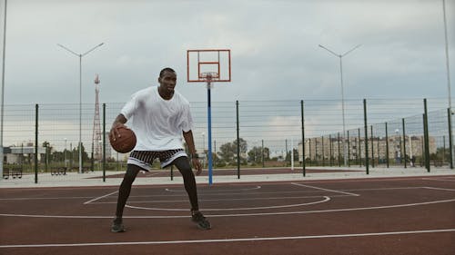 Man Playing basketball