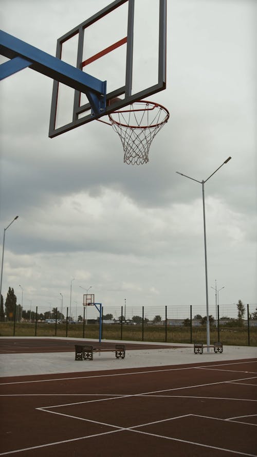 Man Scoring Point in Basketball