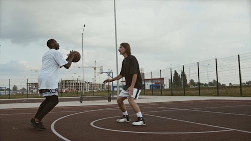 Man Shooting a Basketball