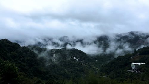 Landscape Scenery of Mountain Under Cloudy Sky