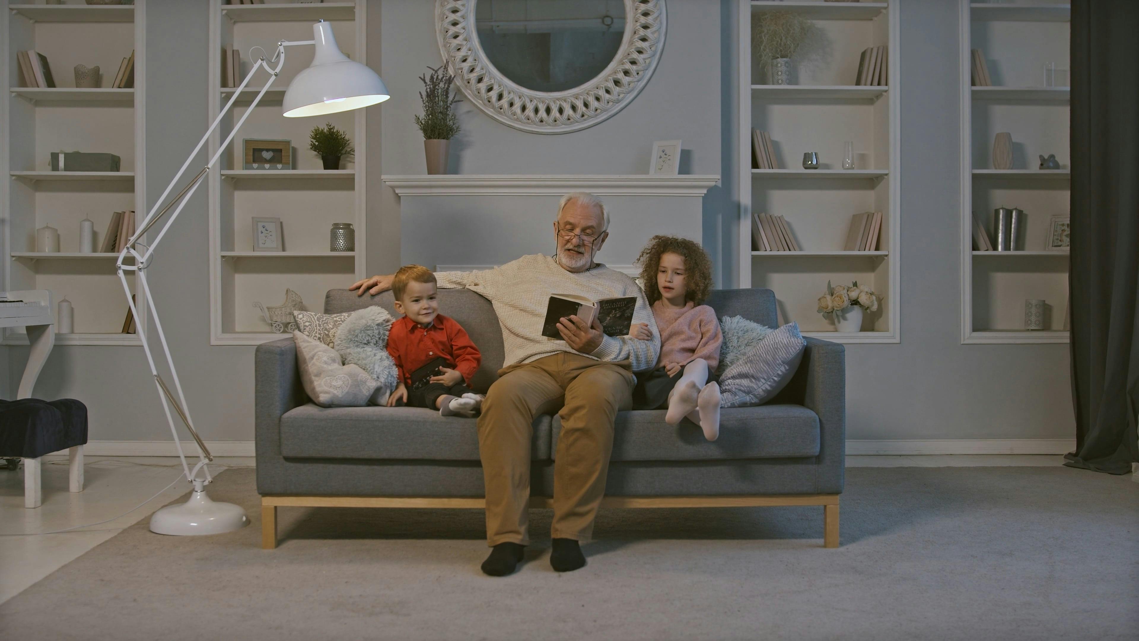 Man Reading A Book To Kids · Free Stock Video