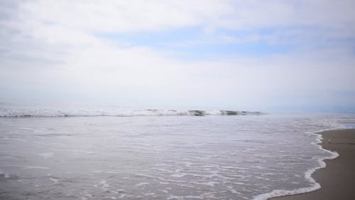 Sea Waves Crashing In The Beach Shore