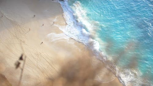 Drone Footage of Waves Crashing on Beach Shore