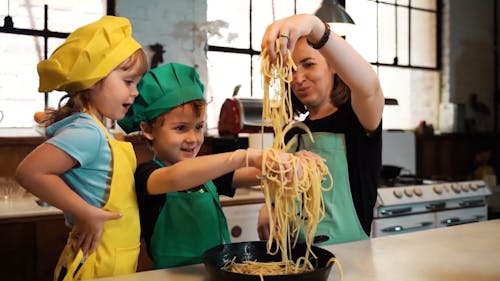 Mother and Kids Cooking Together