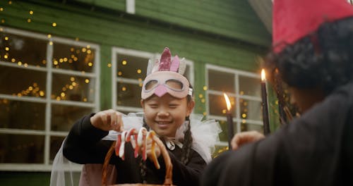 Children Playing With Candies