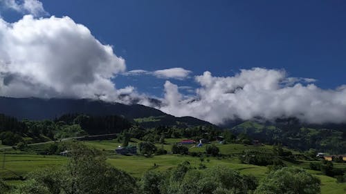 Time-Lapse Video of Green Fields and Mountains During Daytime